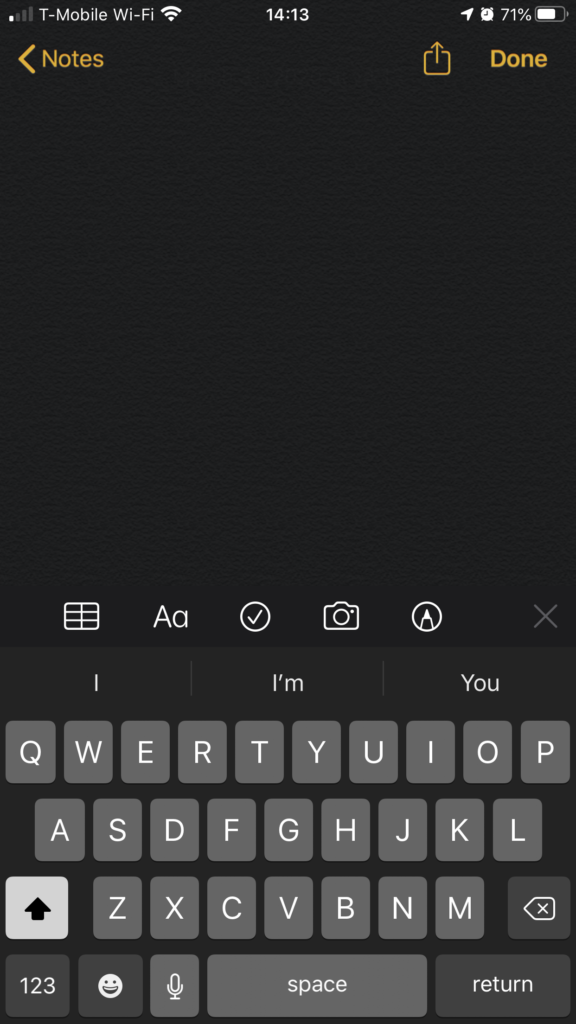 Notes app with Camera icon above the keyboard